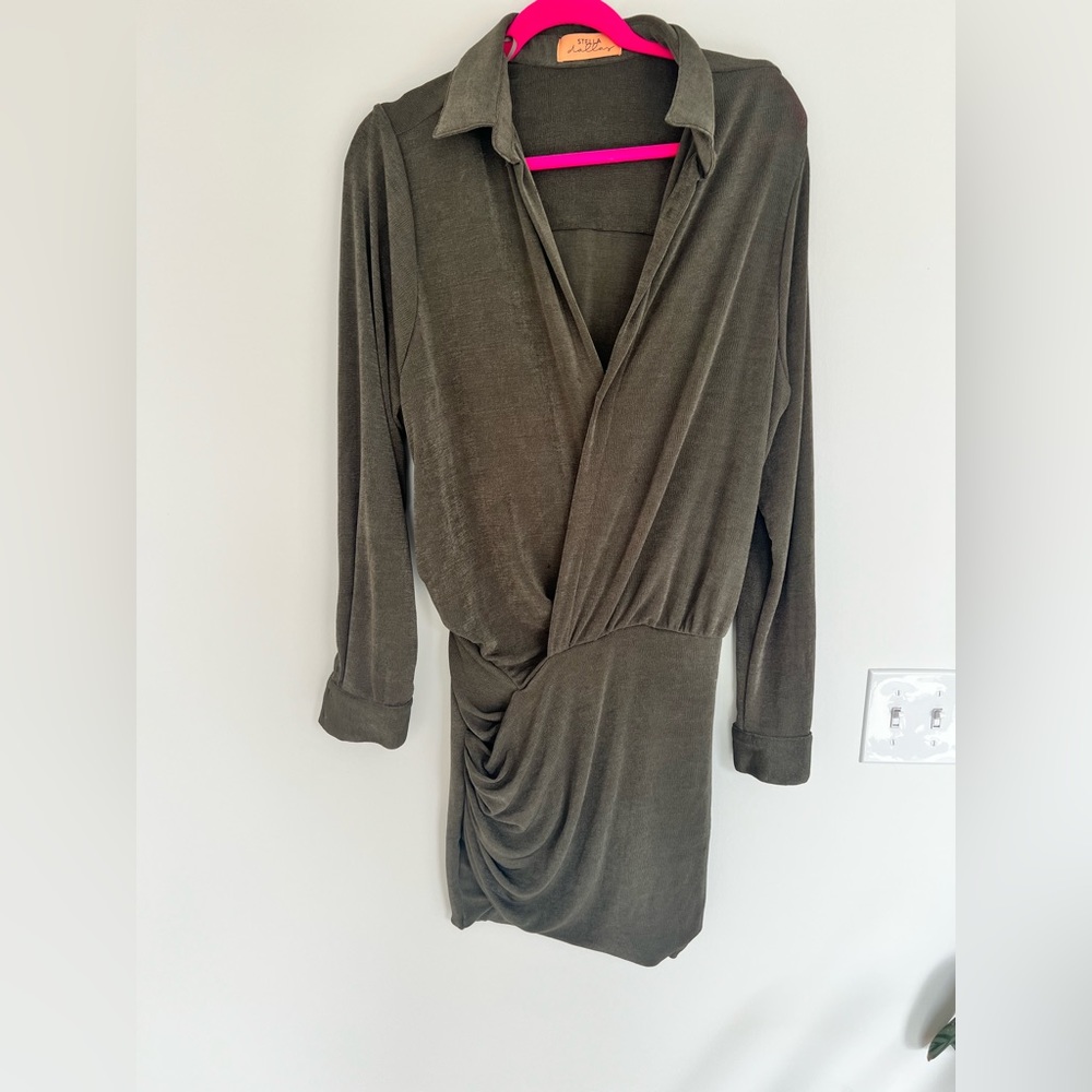 Army green flattering dress, tight on bottom, lose v neck on top,